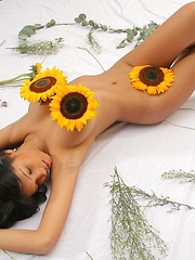 Karla Spice wears nothing but flowers over her naked body